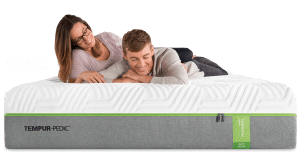 A couple laying on their Tempur-Pedic