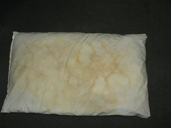 A dirty stained pillow