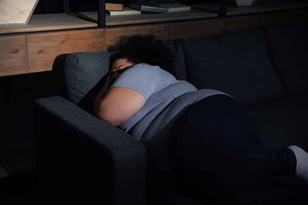 Overweight woman sleeping
